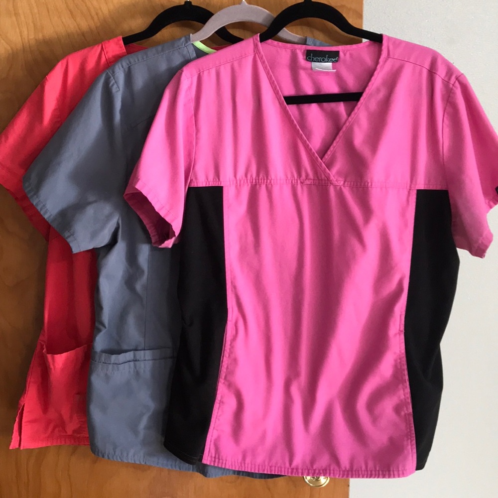 Three XL scrub shirts